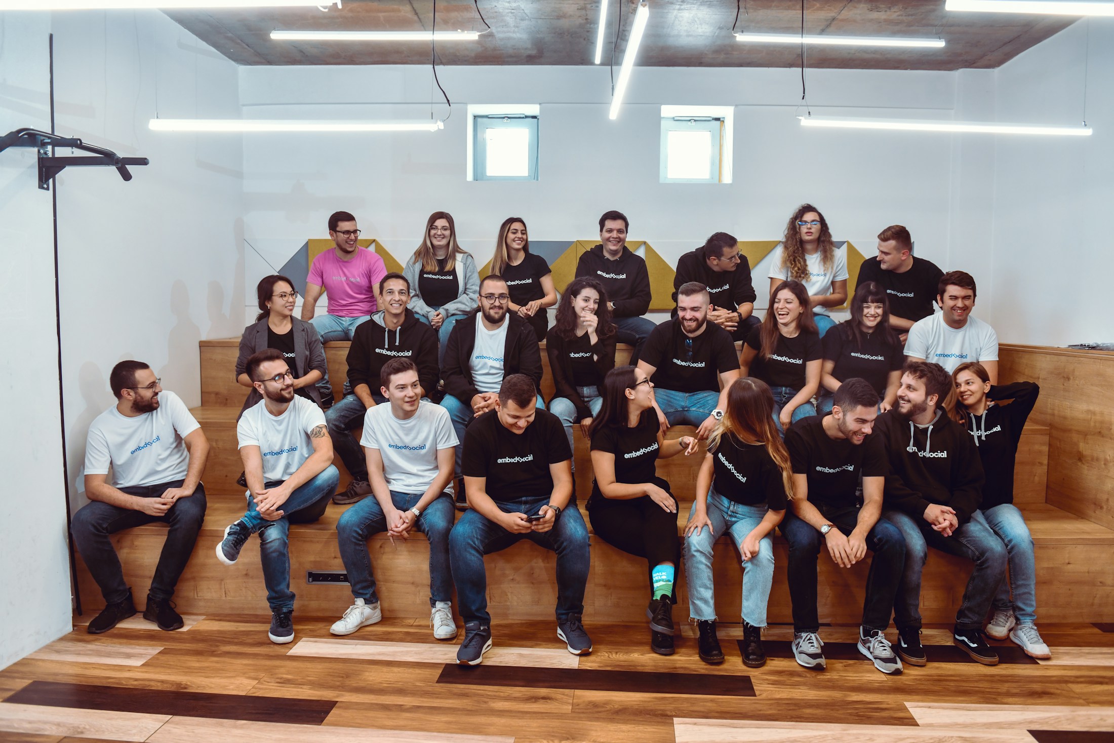 A group gathered in a contemporary workspace